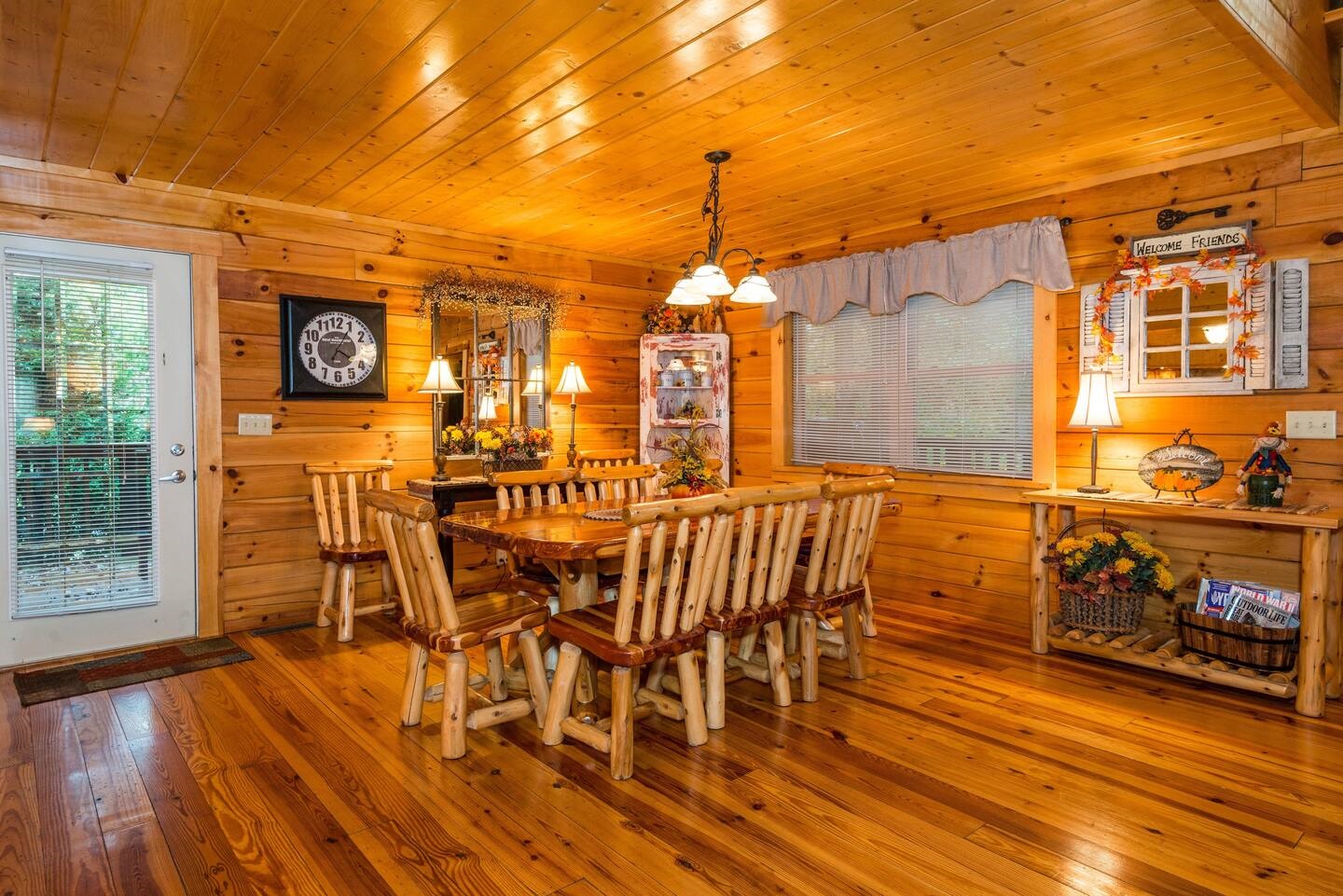 Fairytale Log Cabin dining area with huge massive wooden table