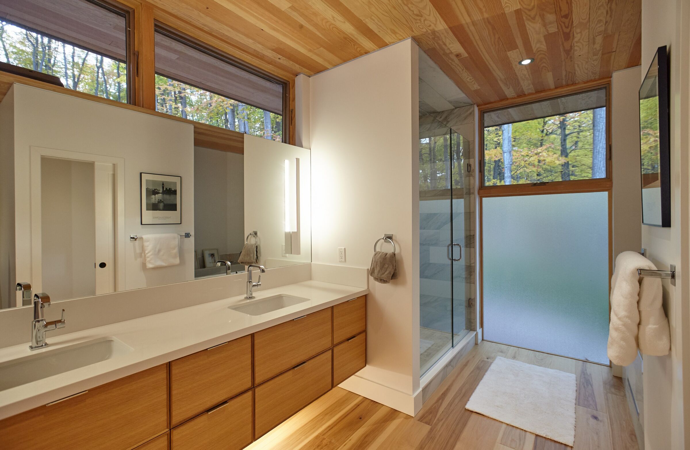 Modern bathroom with windows around the celling