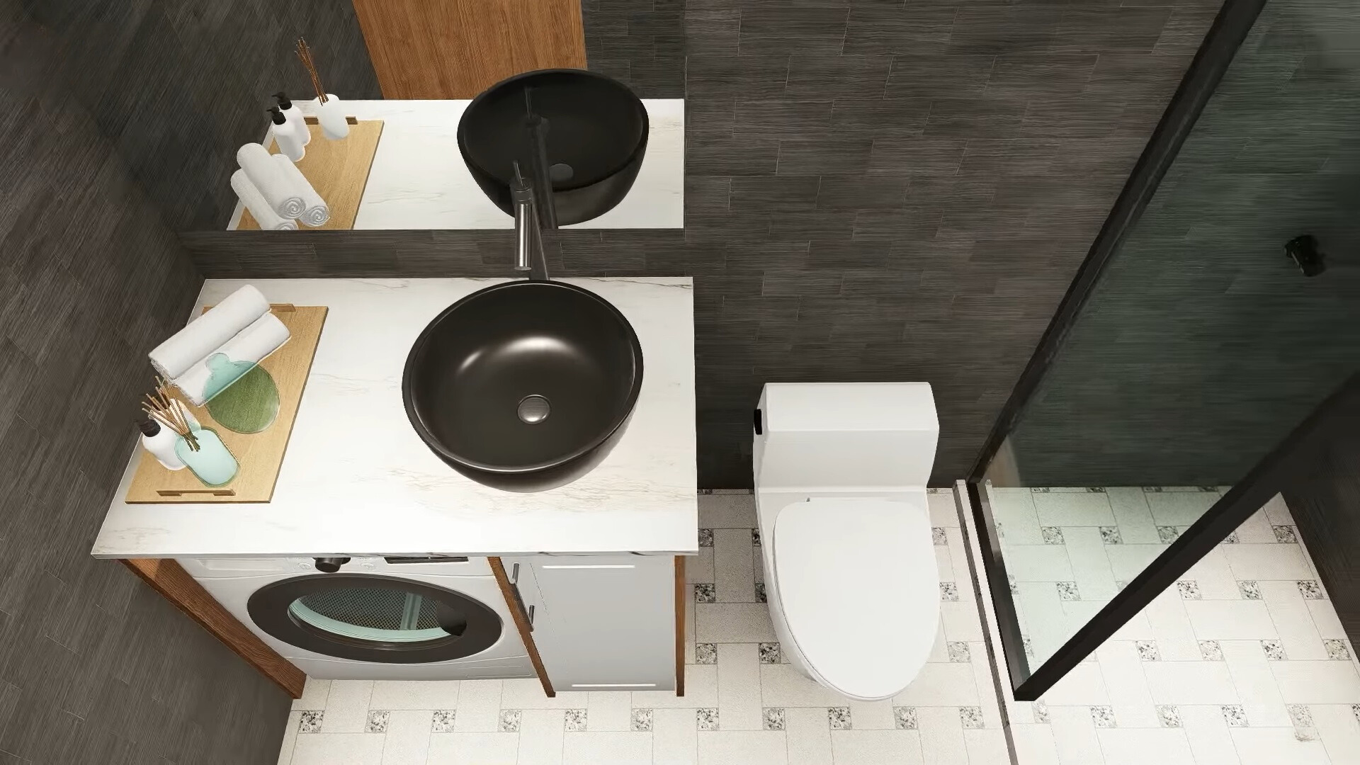 Toilet with black tiles and black sink, glass shower
