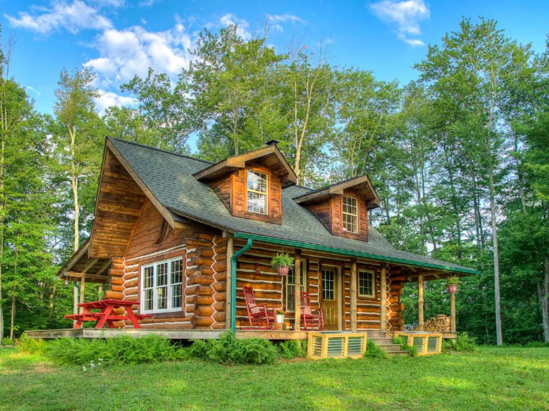 exterior of a wooden cabin in the woods