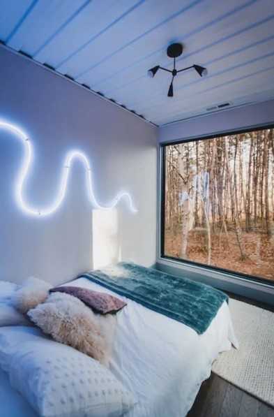 bedroom with a neon light