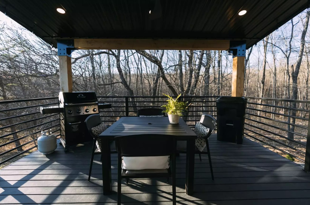 grill on the balcony and a black dining table