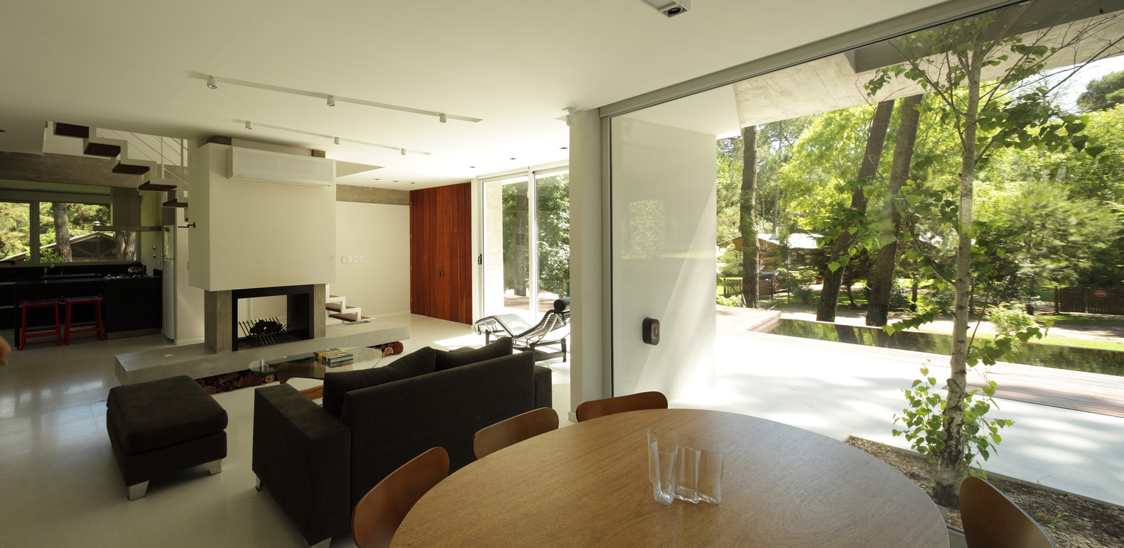 living area with floor to ceiling windows