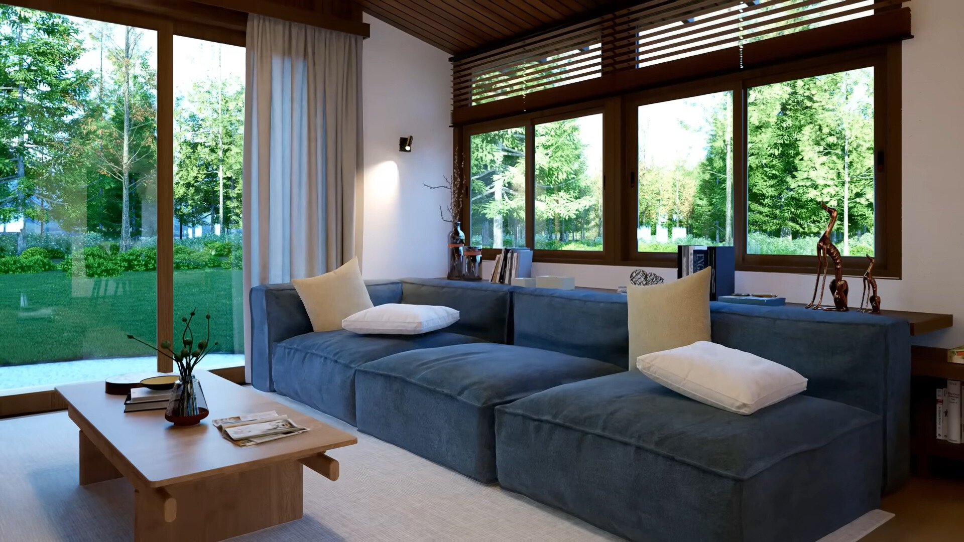 living room with a blue couch and big windows and brown table