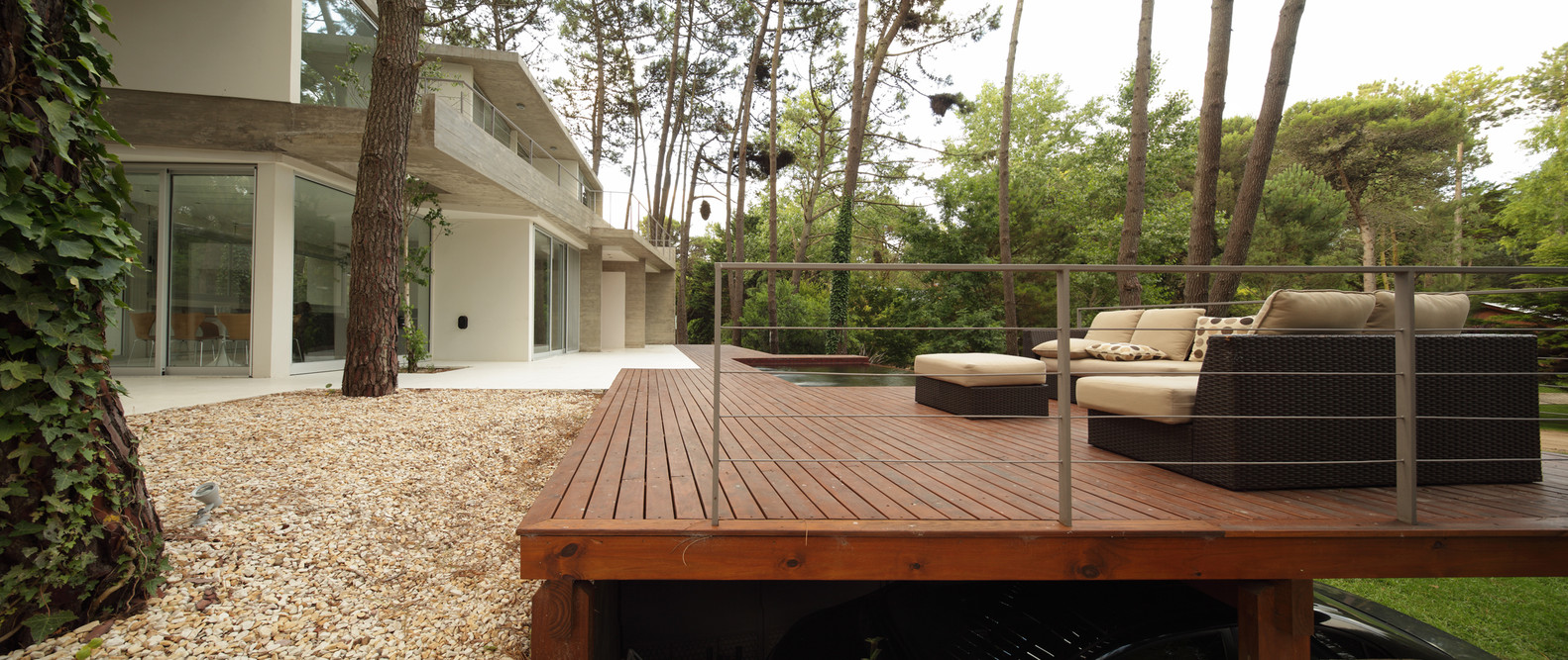 outside area of the house with brown and beige sitting areas