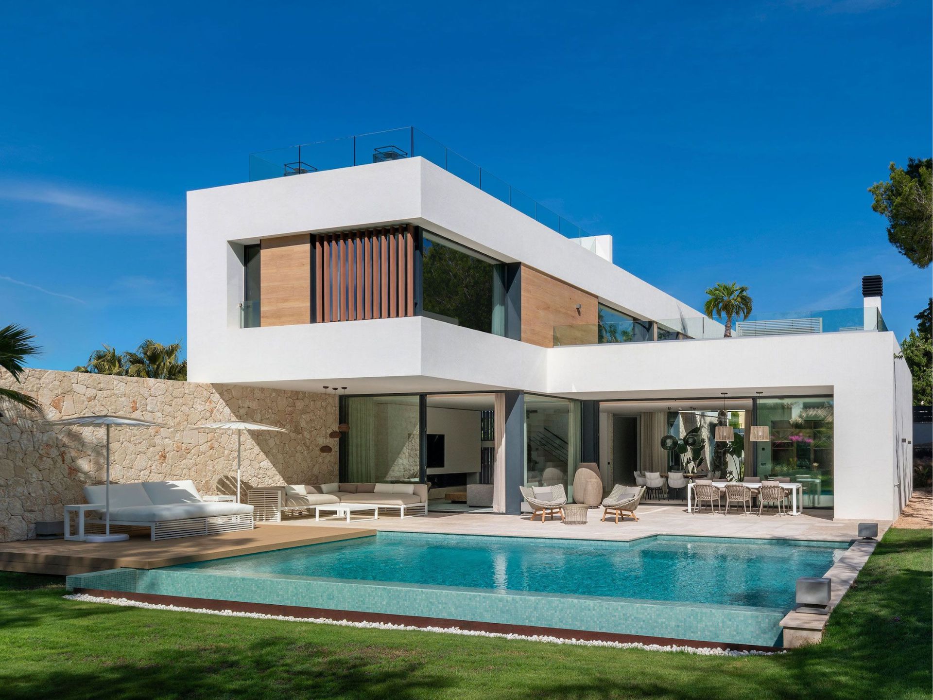 exterior of a modern home with a pool