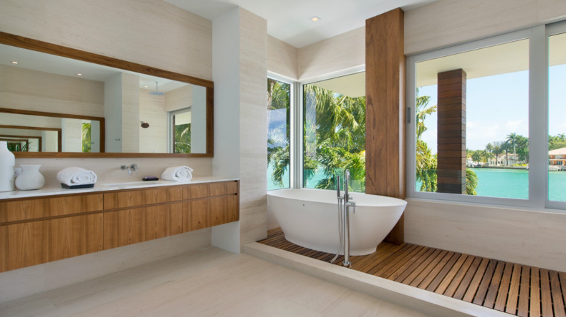 Bathroom with large bath with view