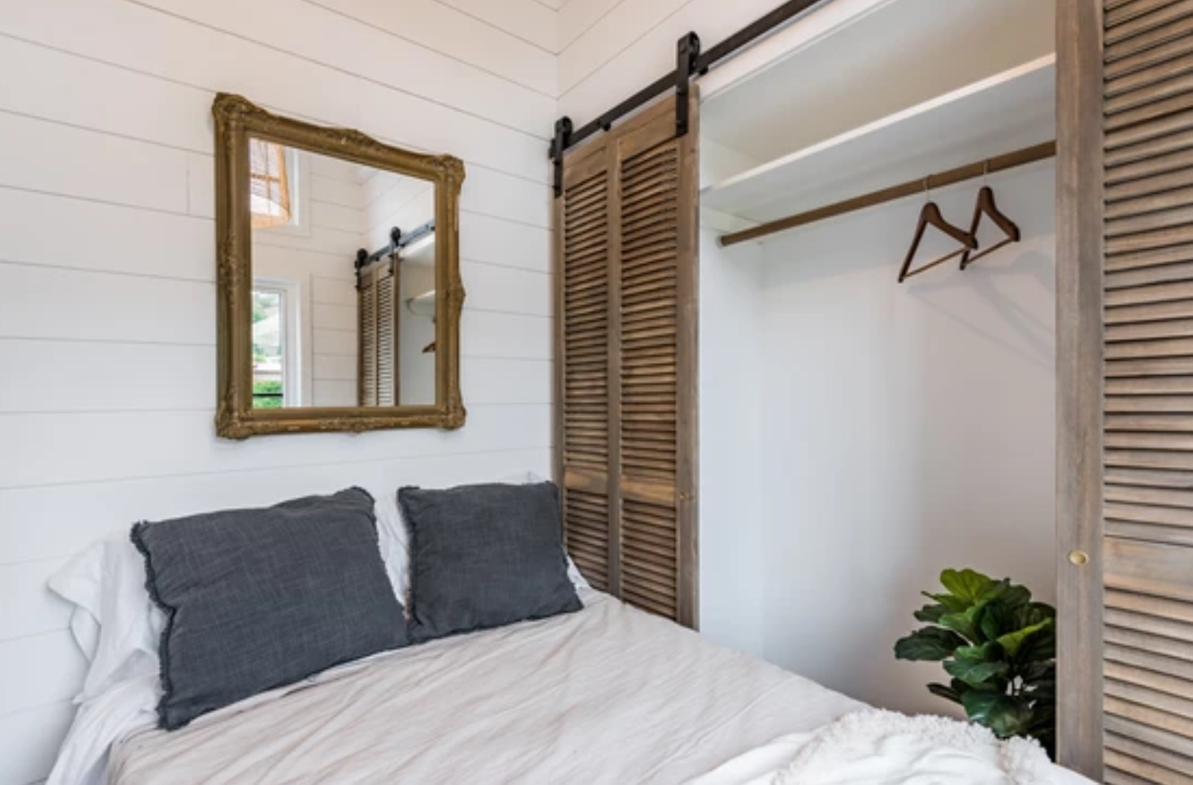 Bedroom of bohemian home with closet