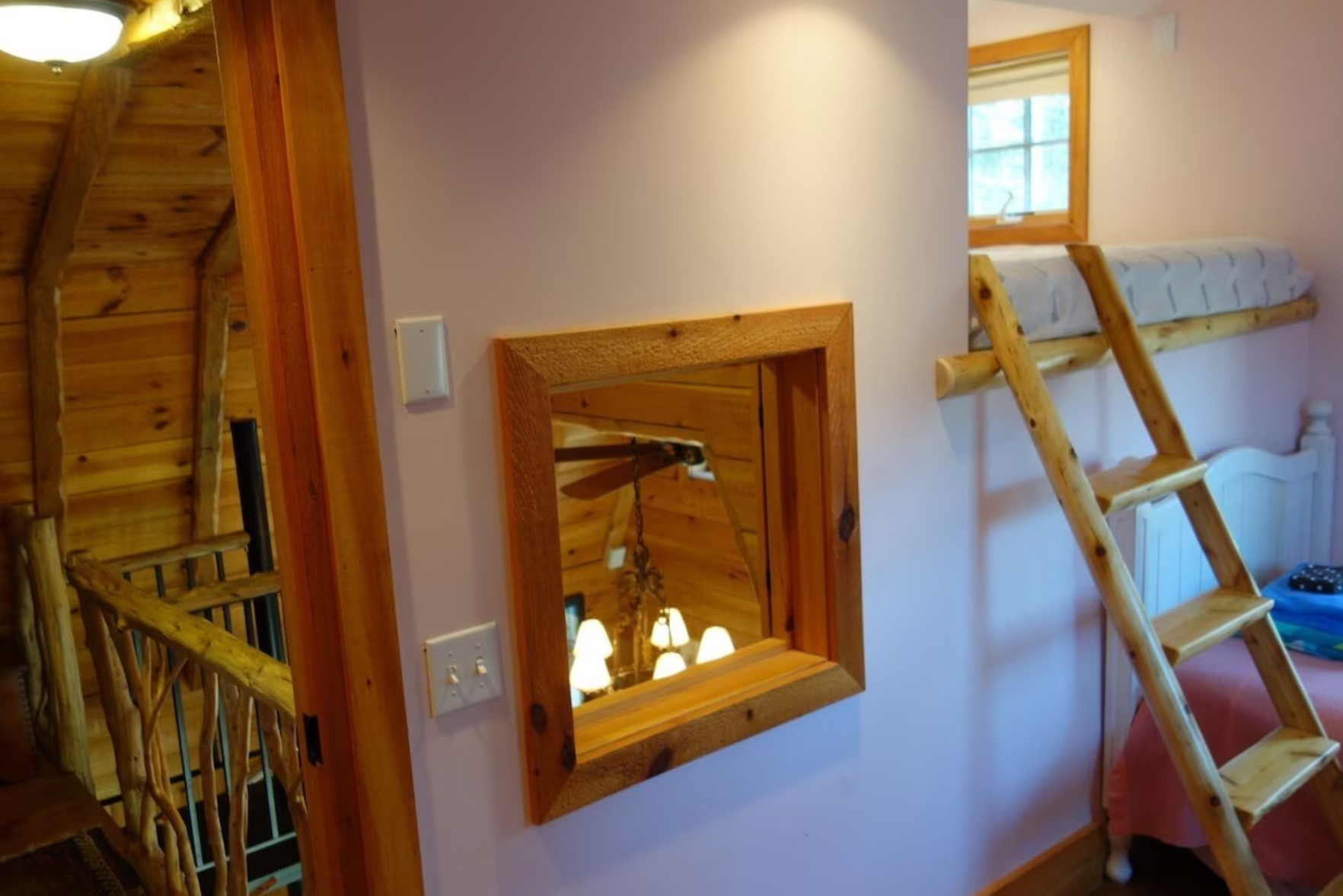 bed room with bunk beds and a wooden ladder