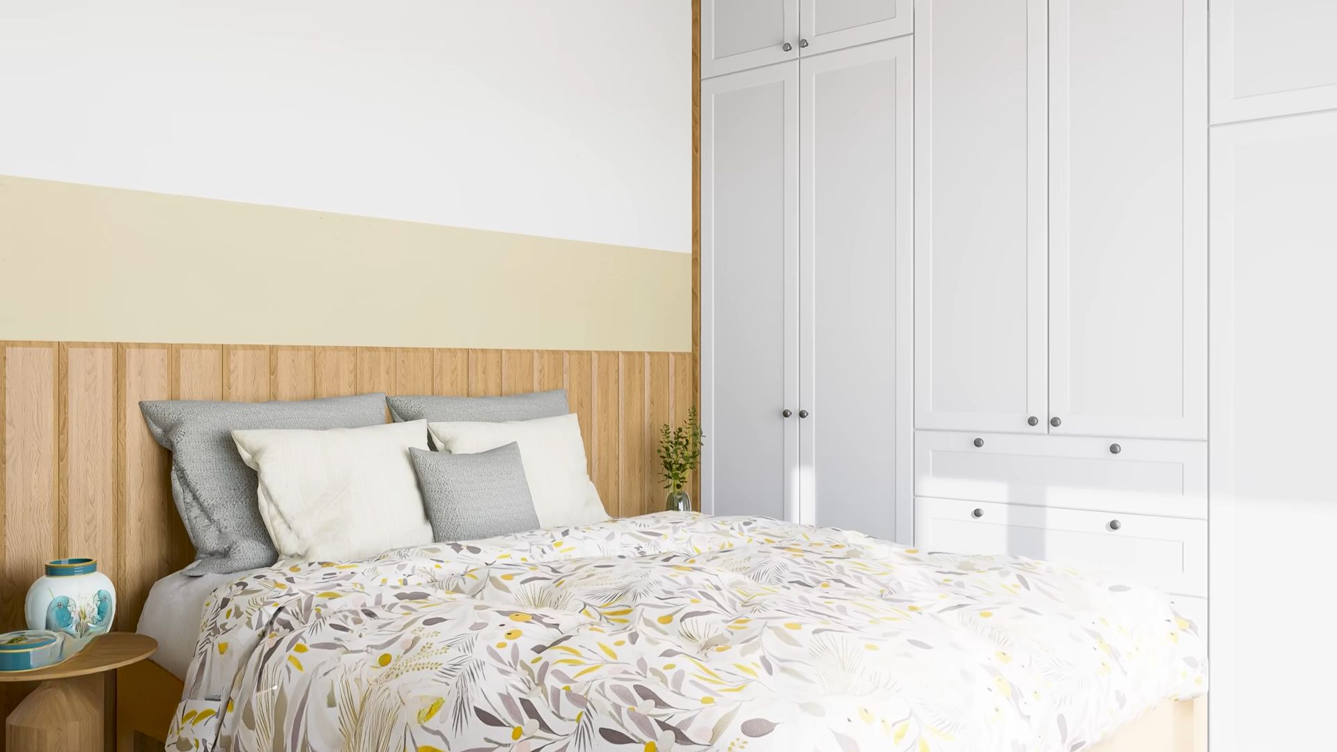 Master bedroom with colorful bedding and a white built in closet