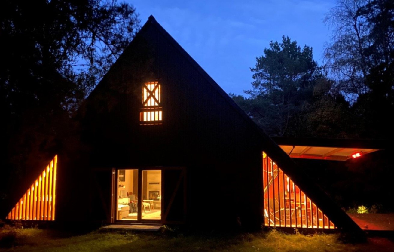 triangular cabin in the woods