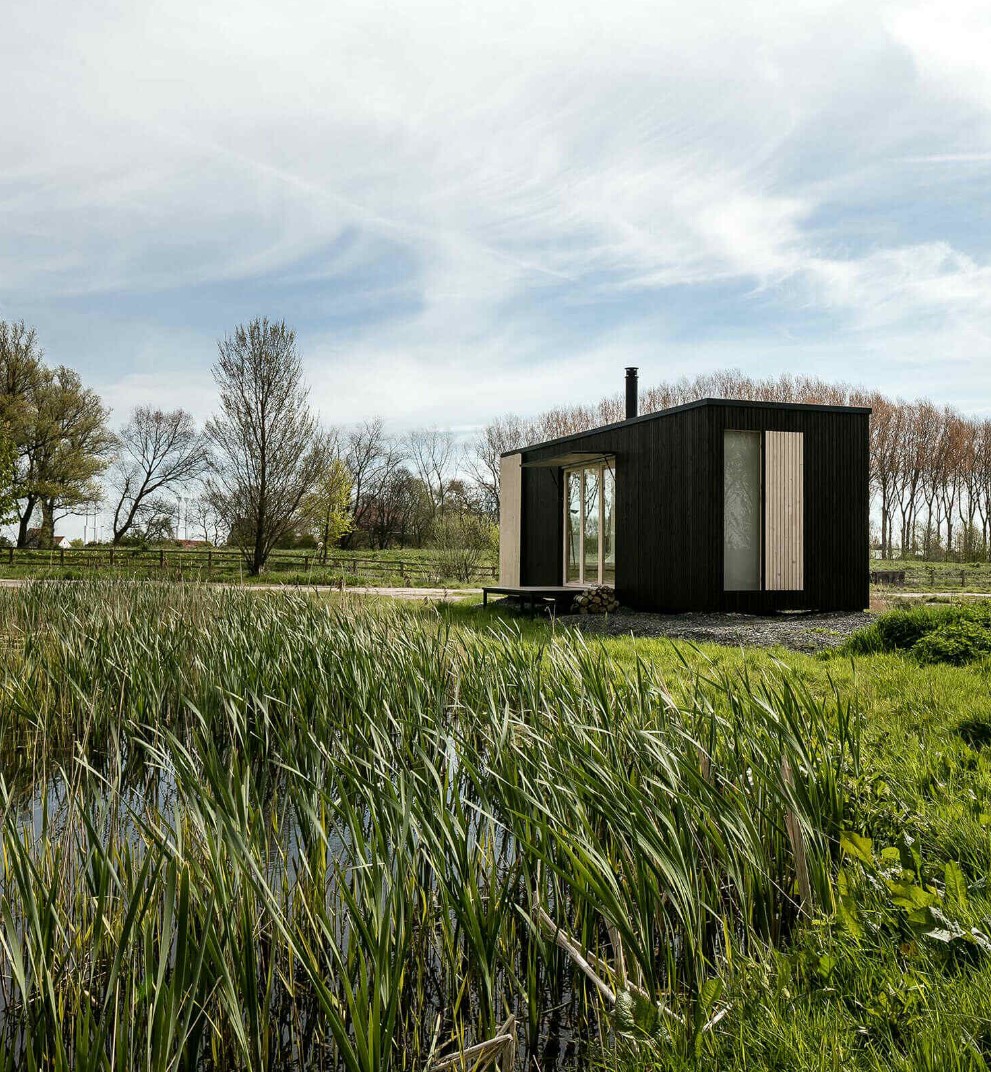 Black container home in nature