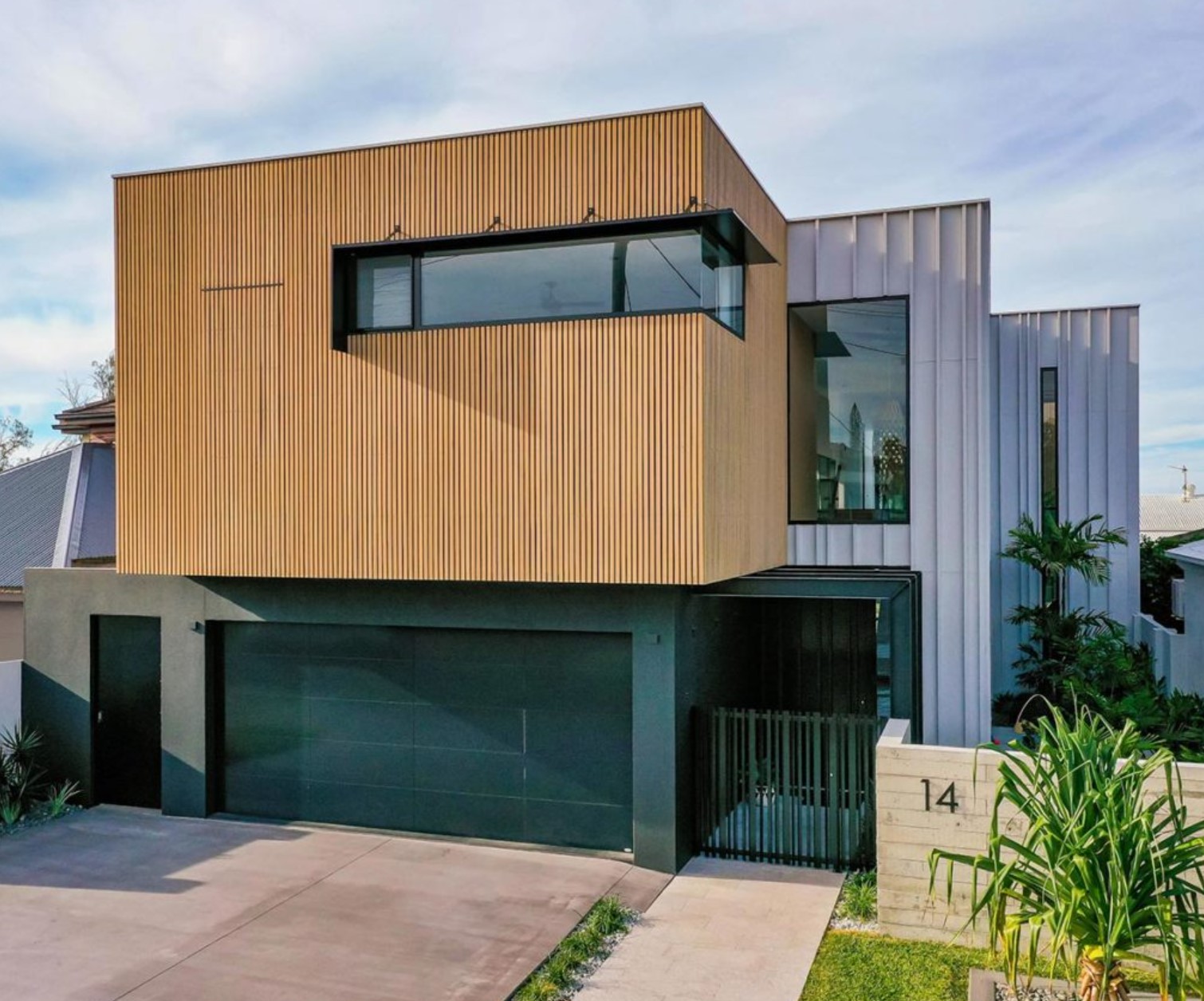 exterior of modern home with big garage