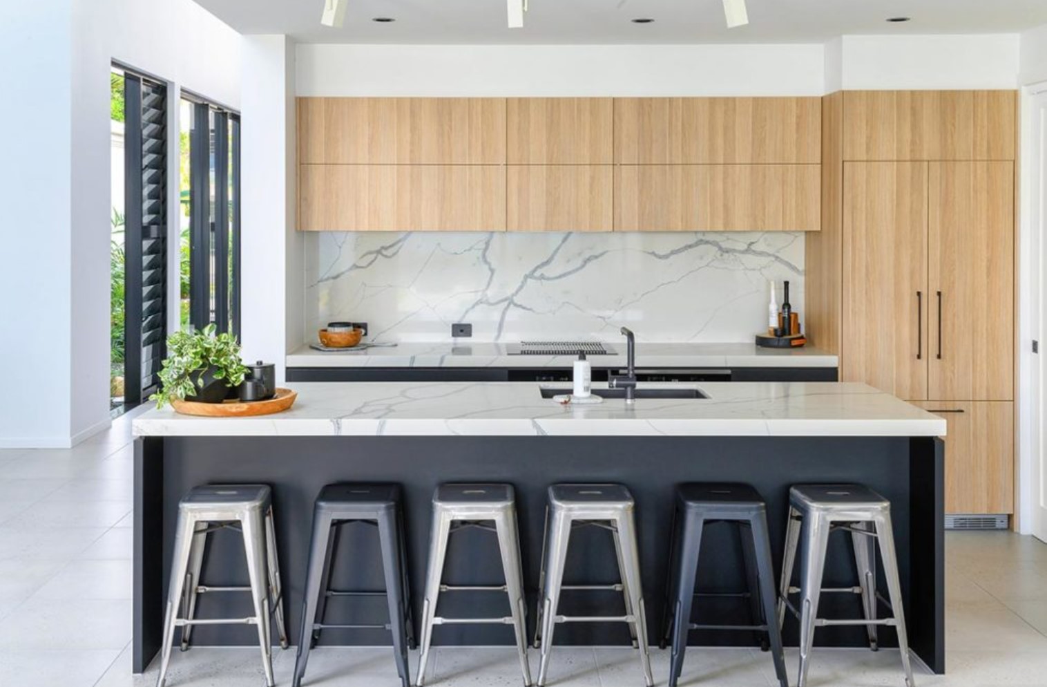 modern kitchen with black island