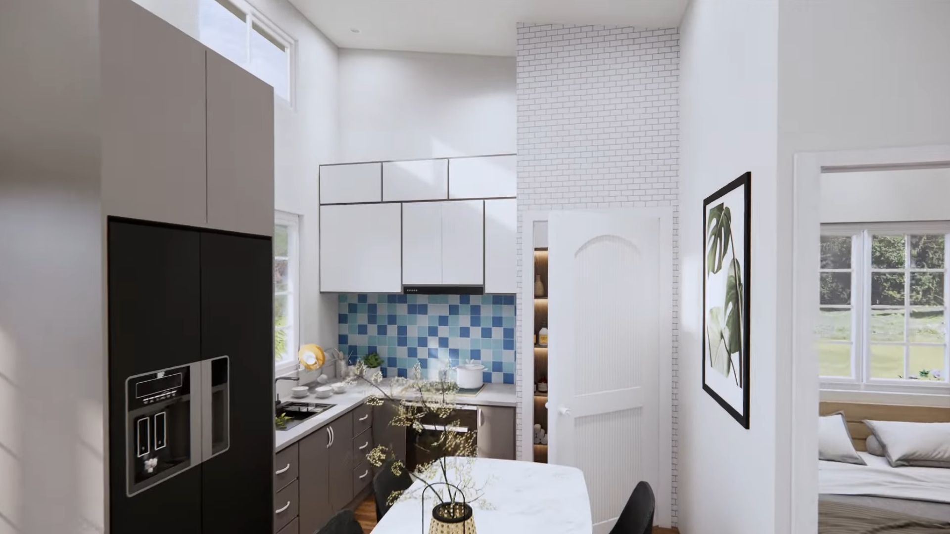 L-shaped kitchen in white and grey, with a double-door fridge, and a white marble dining table and emerald green chairs