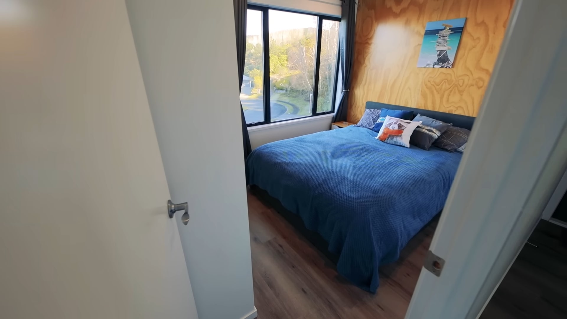 Container home bedroom with large bed