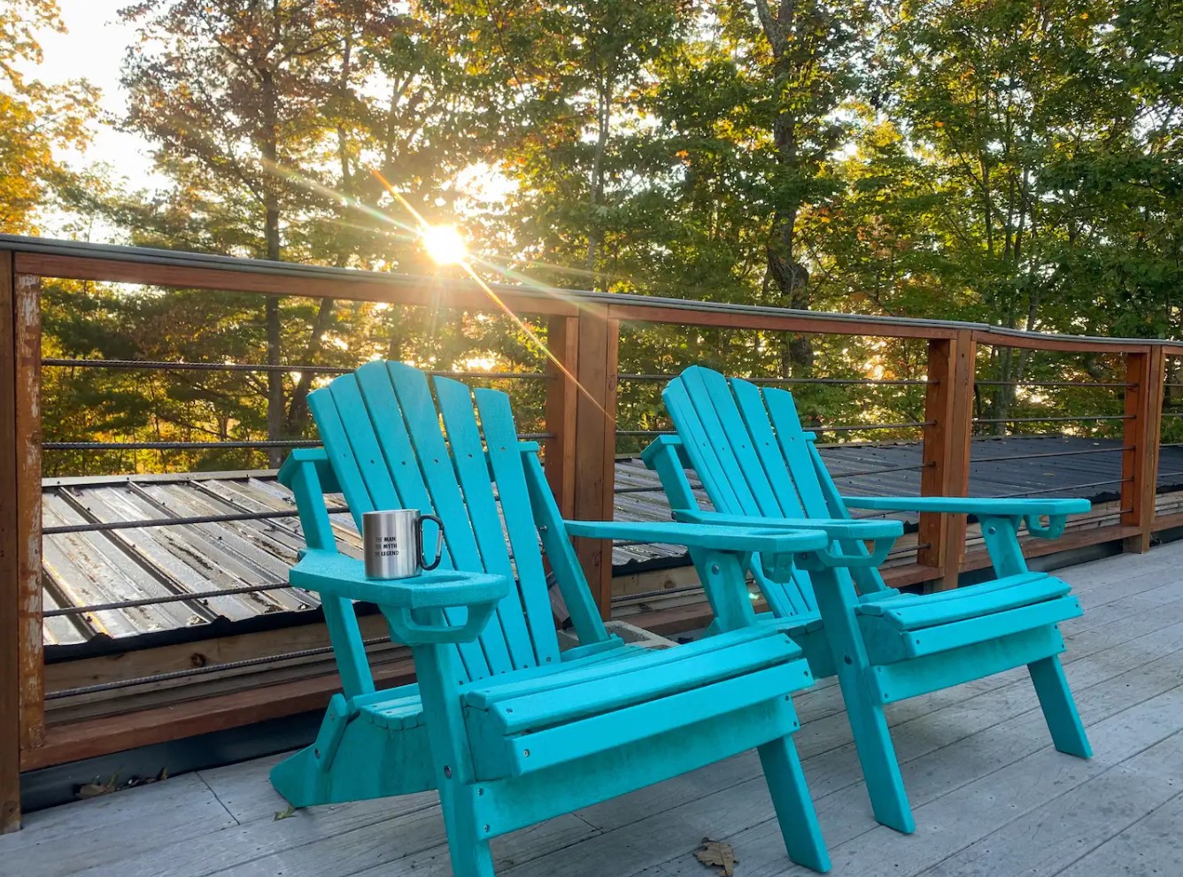 Observation deck in woods with chairs