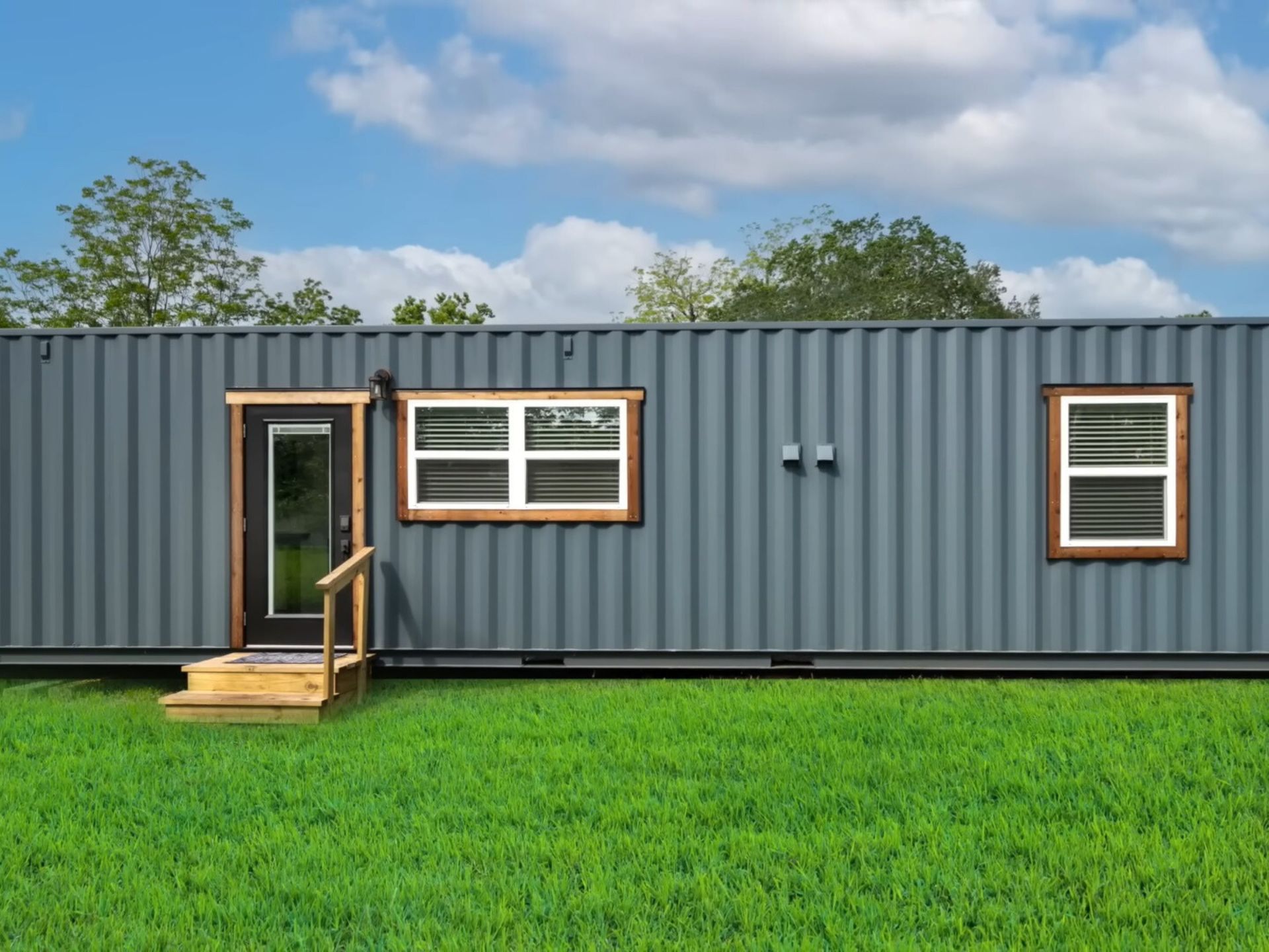 exterior of a blue container house