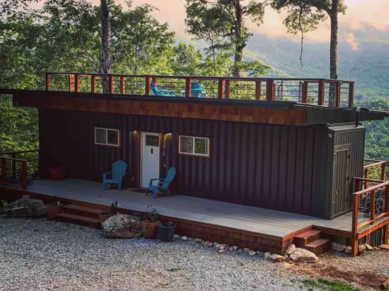 container cabin with deck in forest