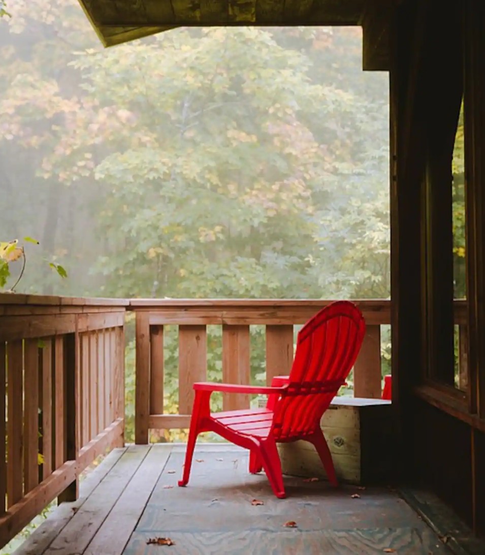 wraparound porch with chair and view