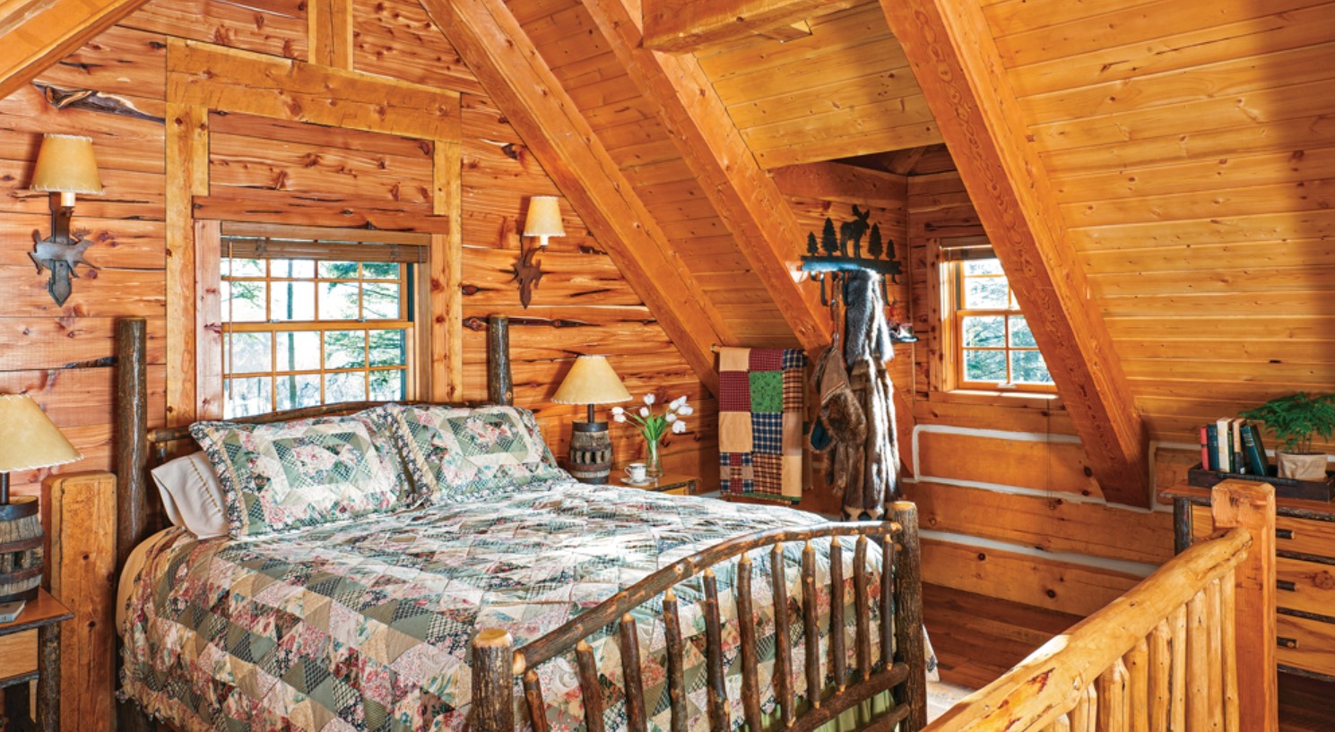 Bedroom with high ceilings and wooden bedframe