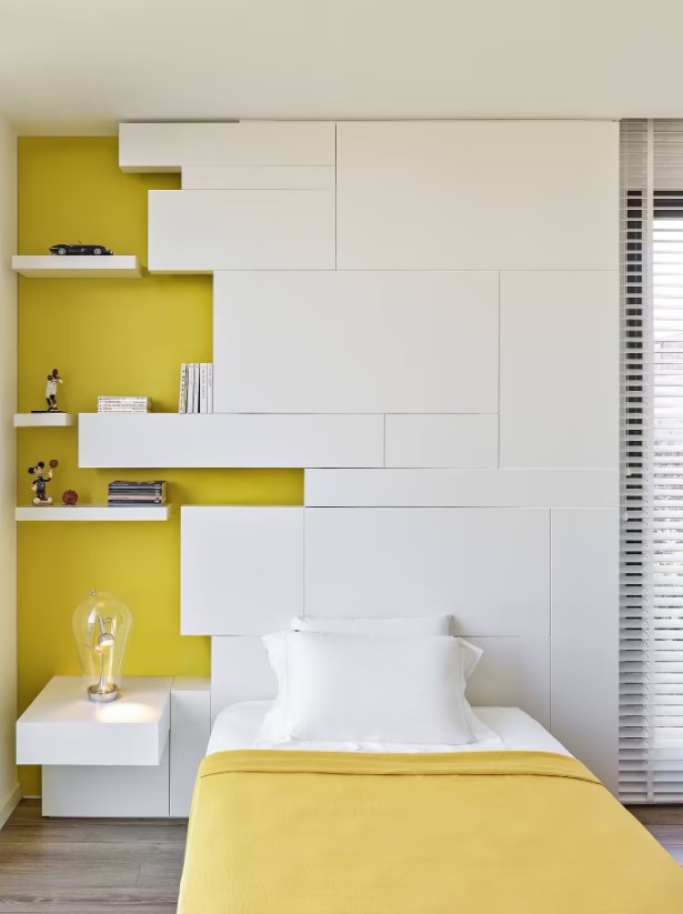 bedroom with white and yellow walls