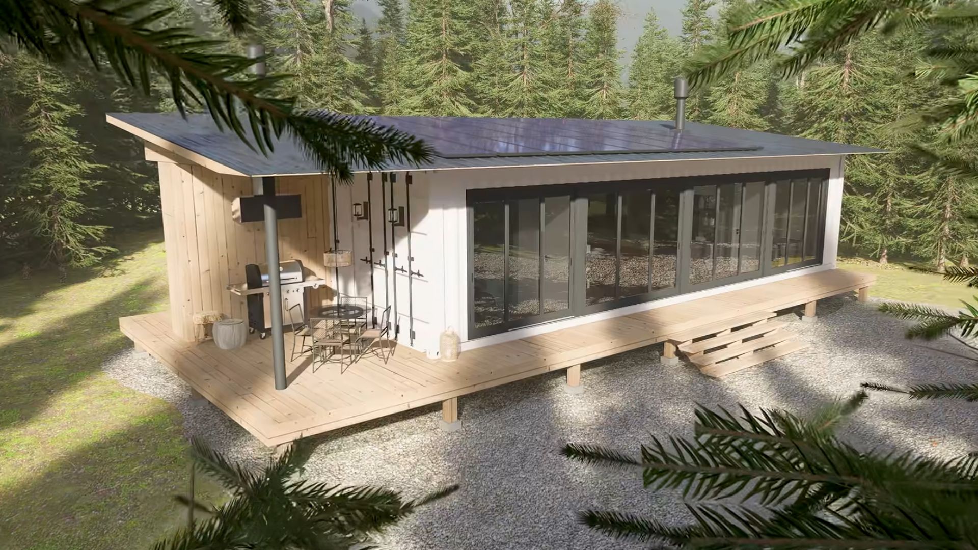 exterior of the three bedroom container home with a nice deck all around it