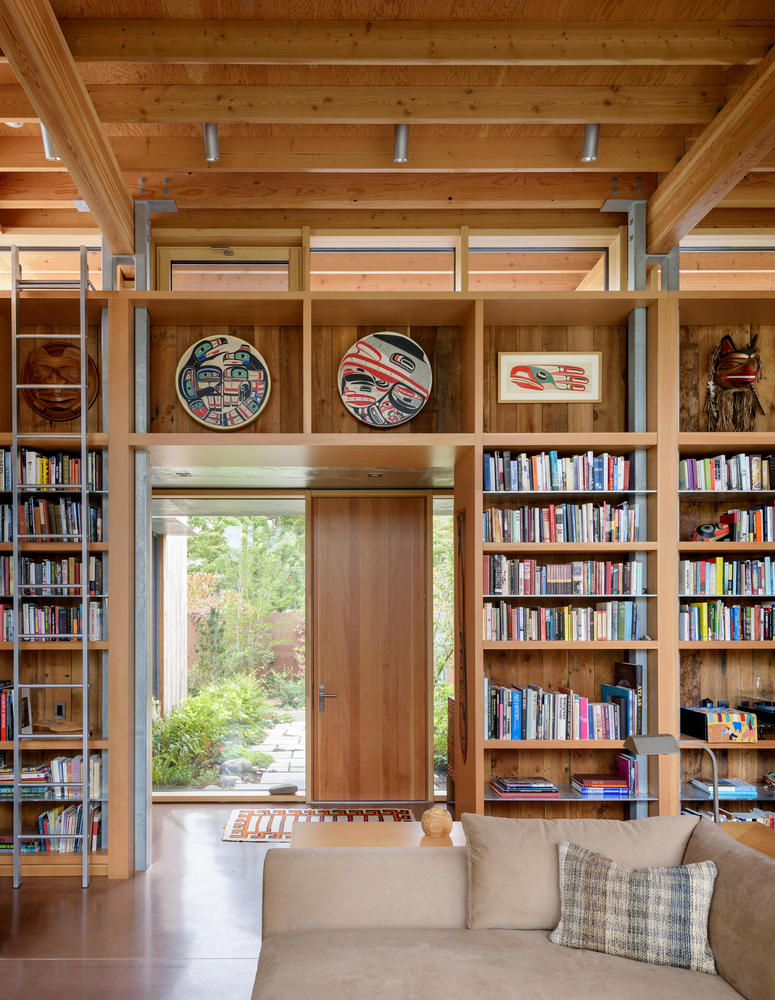 floor to ceiling bookshelf with a ladder