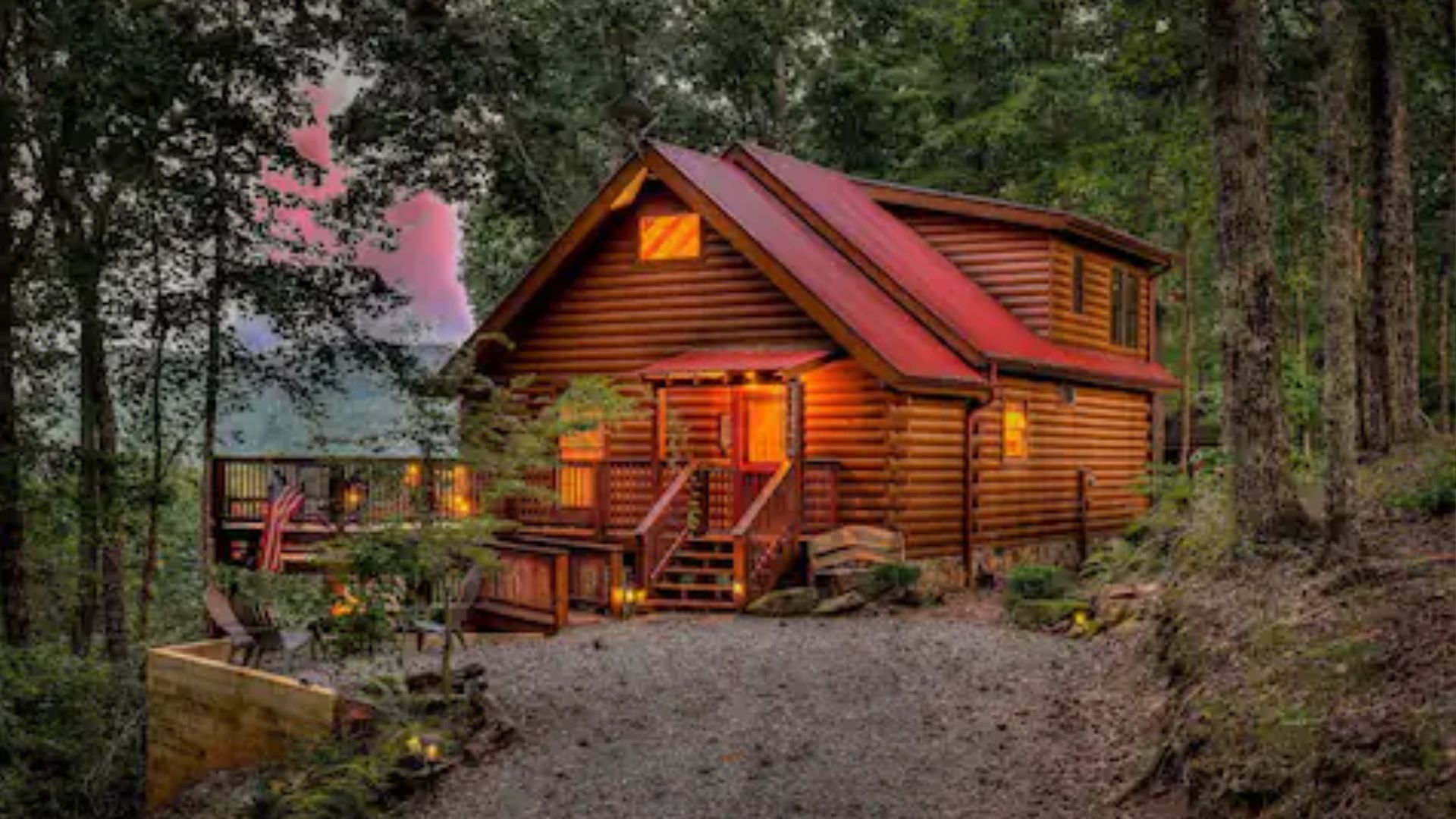 rustic log cabin and a wide driveway