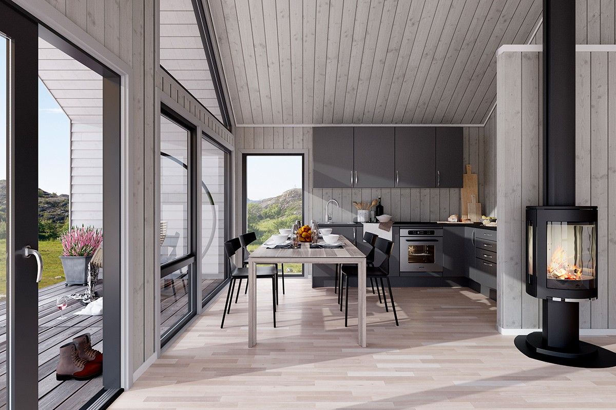 kitchen with gray cabinets, a dining table and four, black chairs surrounding it