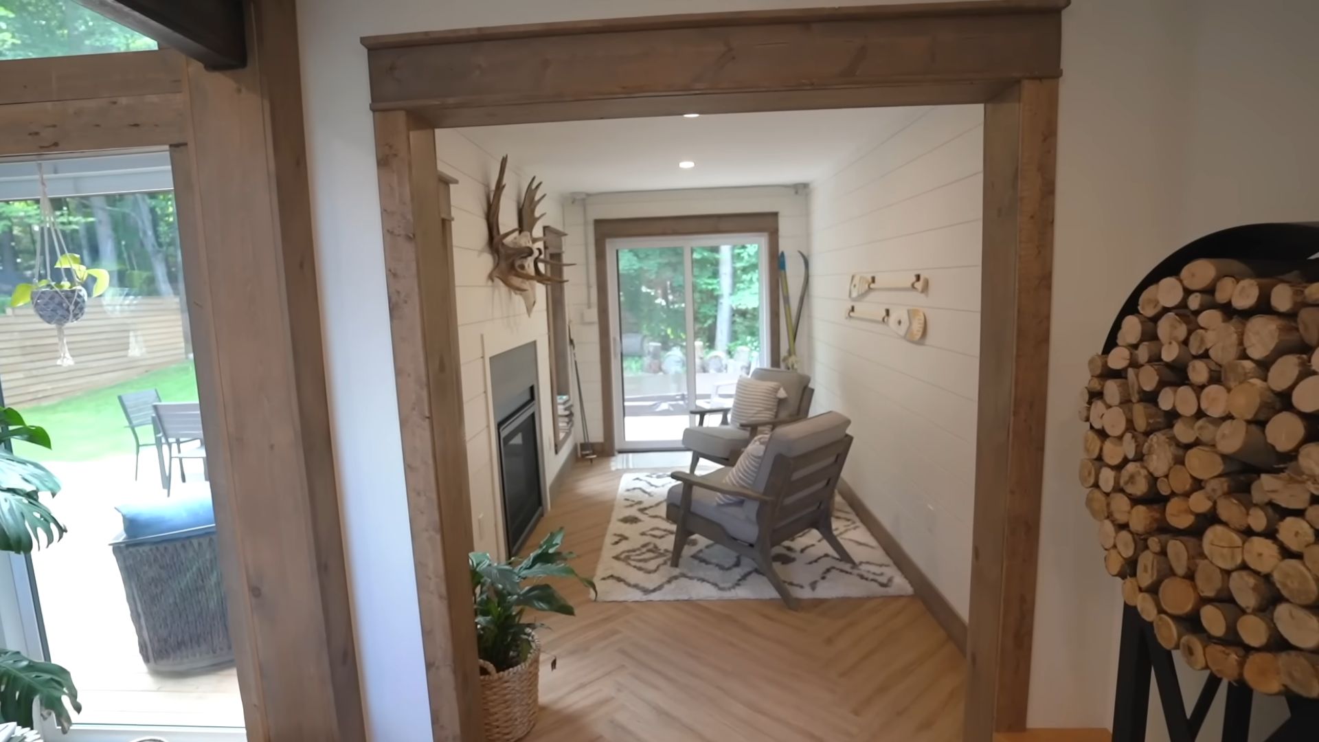 hidden sitting area with two comfy armchairs and a big picture window