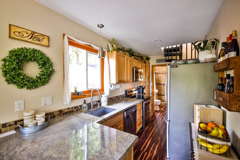 kitchen with brown cabinets and a big window