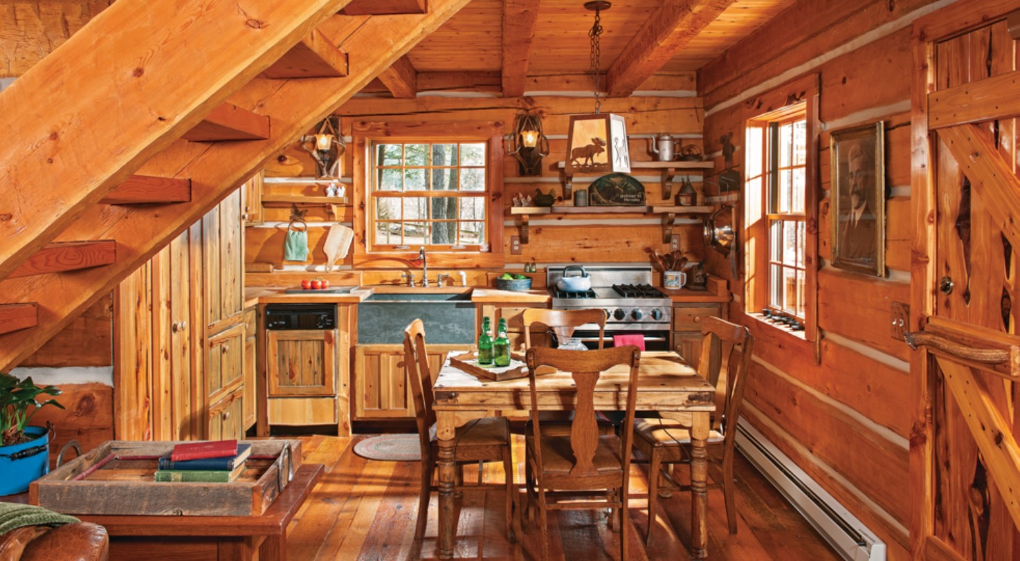 Kitchen with wooden cabinets, dining table and windows