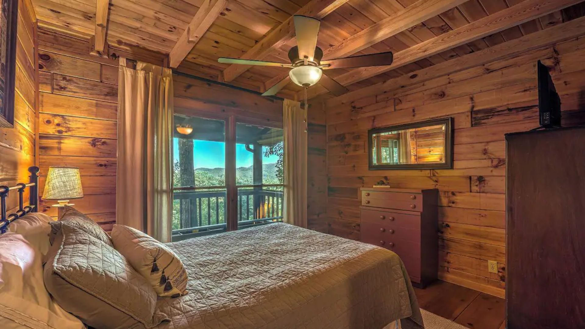 comfy master bedroom with a view