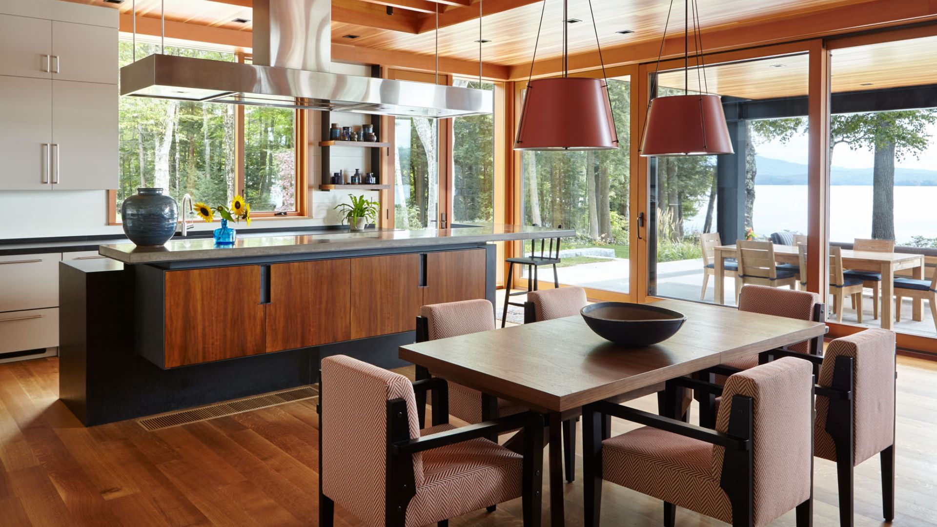 open space modern kitchen and informal dining room with a view