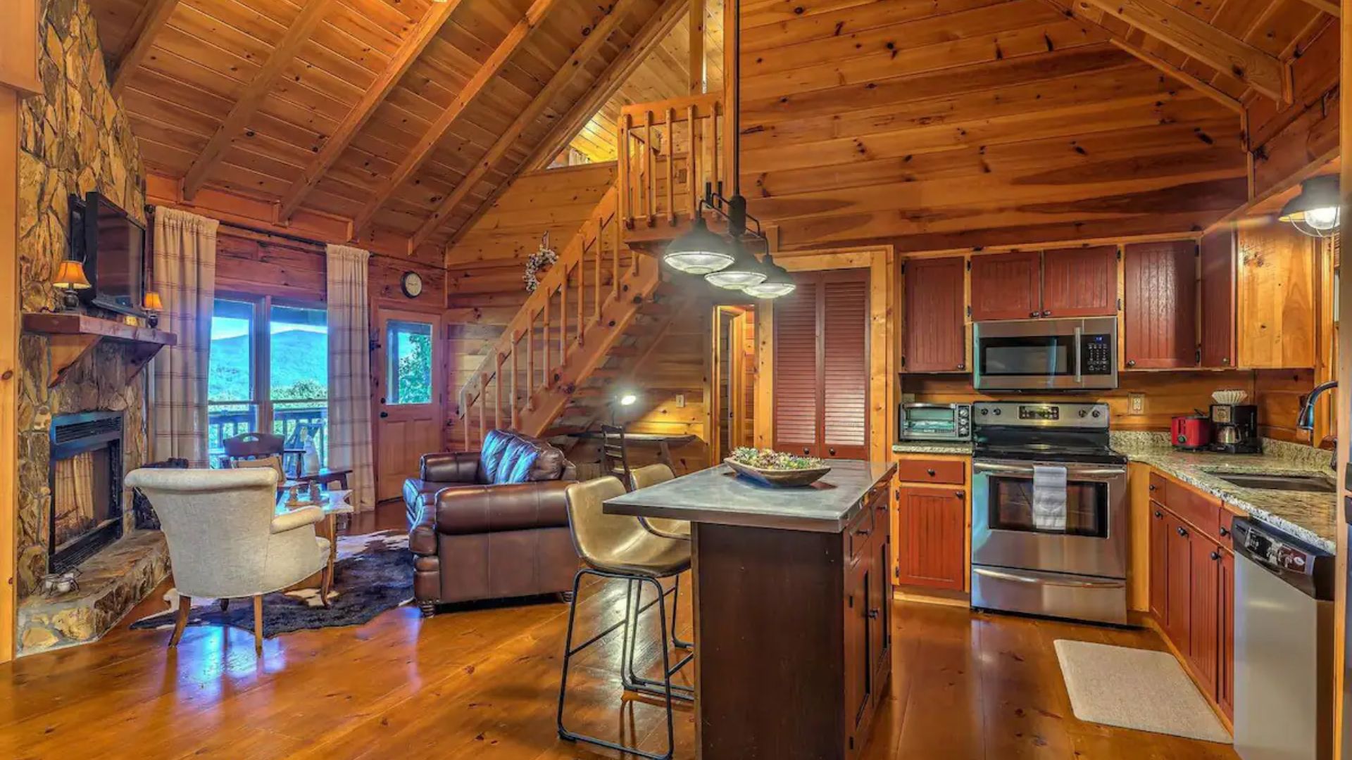 open concept kitchen and dining room with a living room