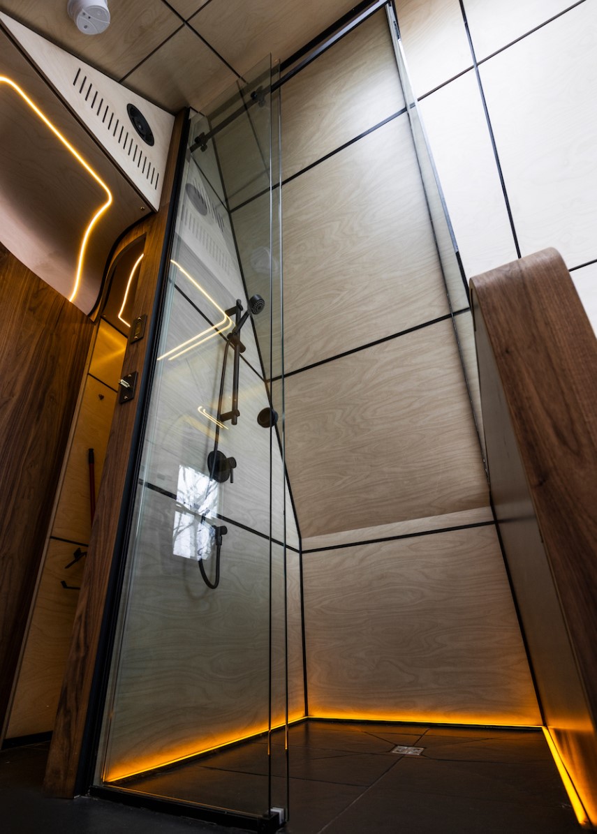 Modern shower with glass doors and a LED shower