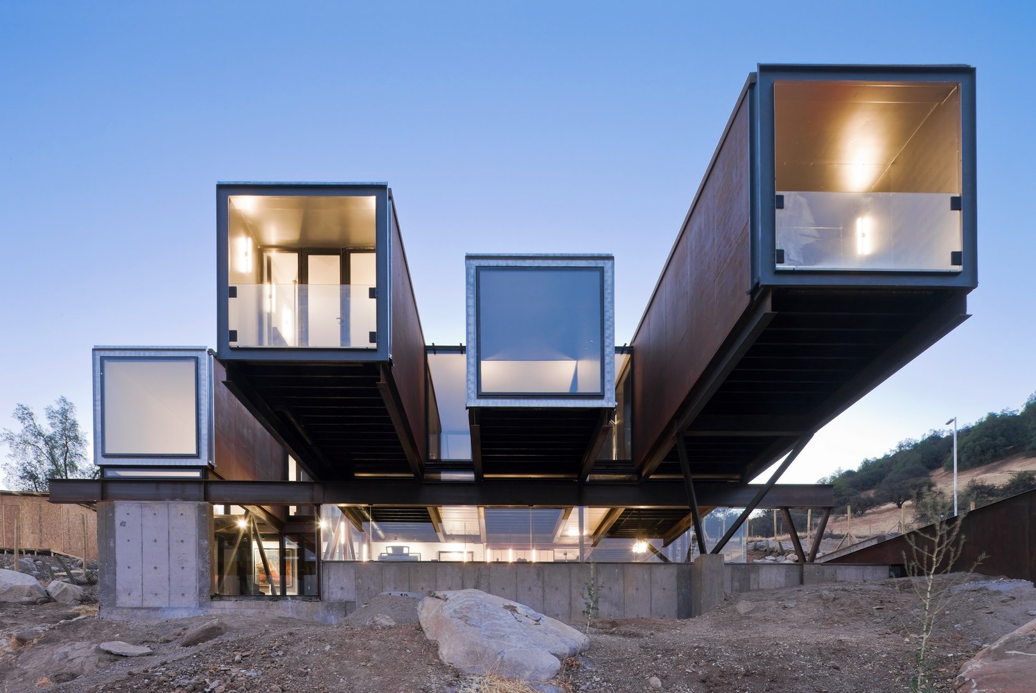 uniquely shaped container house with big windows