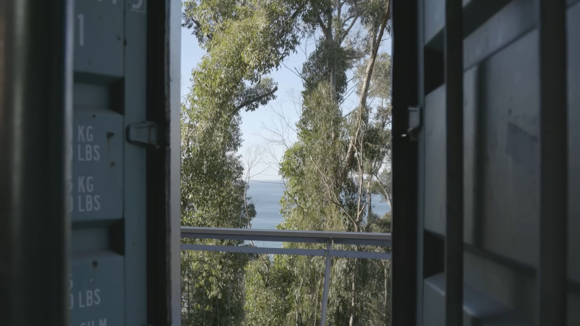 view of the sea from a shipping container house