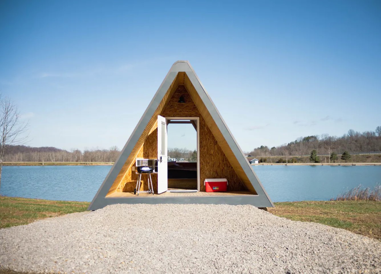 Minimalistic A shaped cabin by a lake