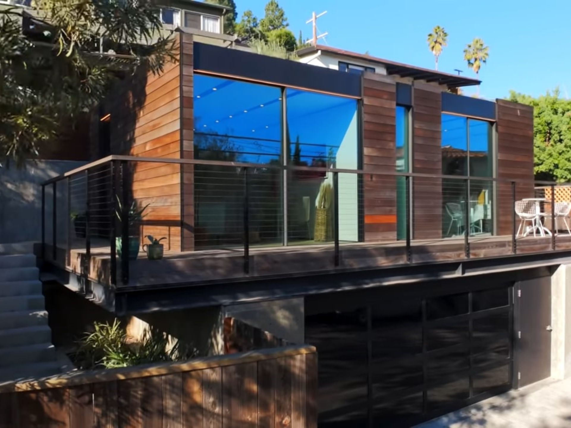 A tiny house with glass panels