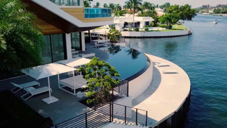 exterior of a modern house surrounded by water