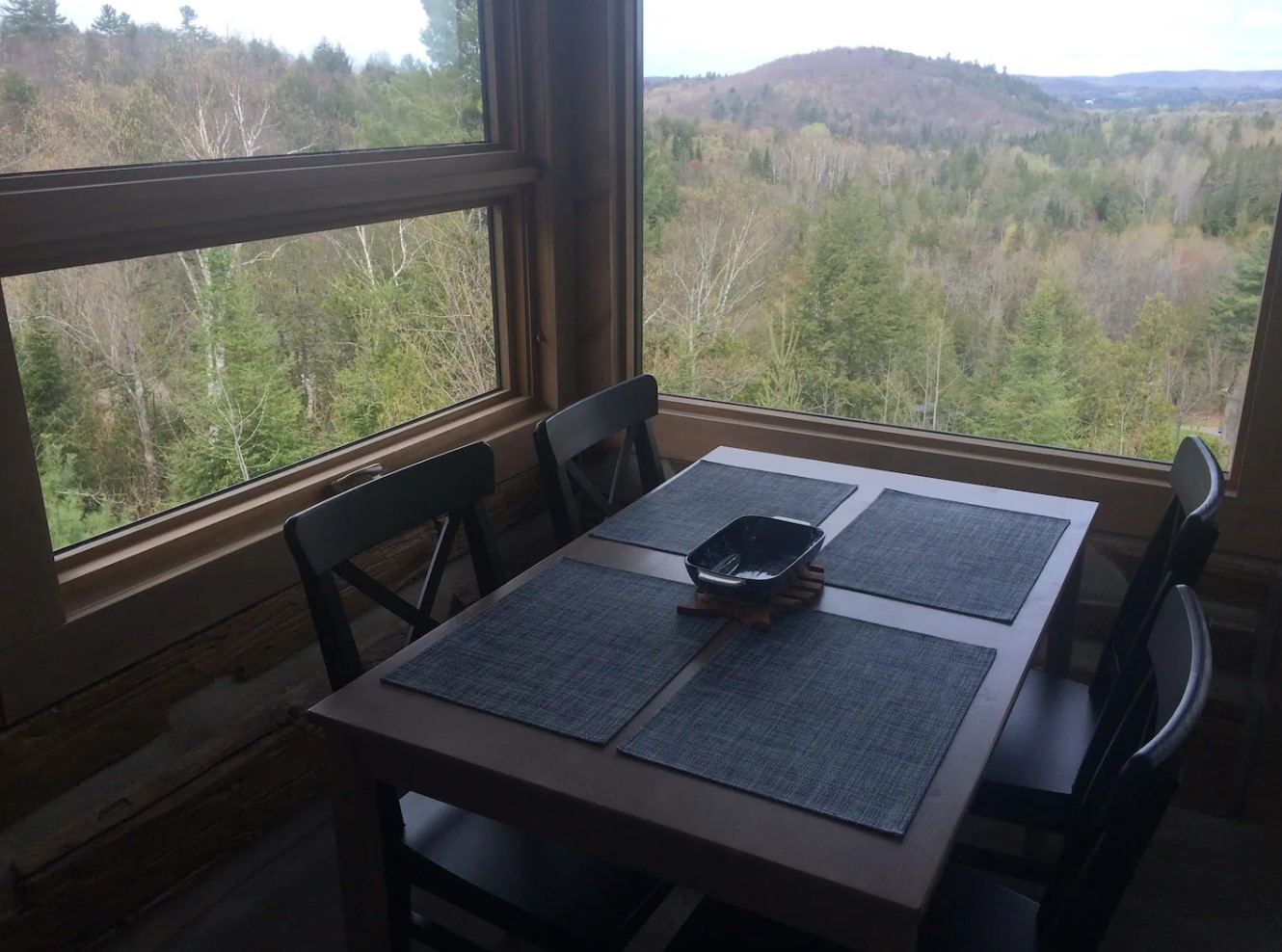 Dining room with a wooden table and incredible view