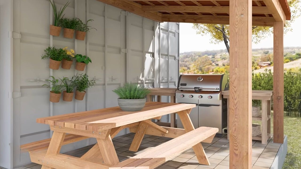 Outdoor grill on porch with picnic table