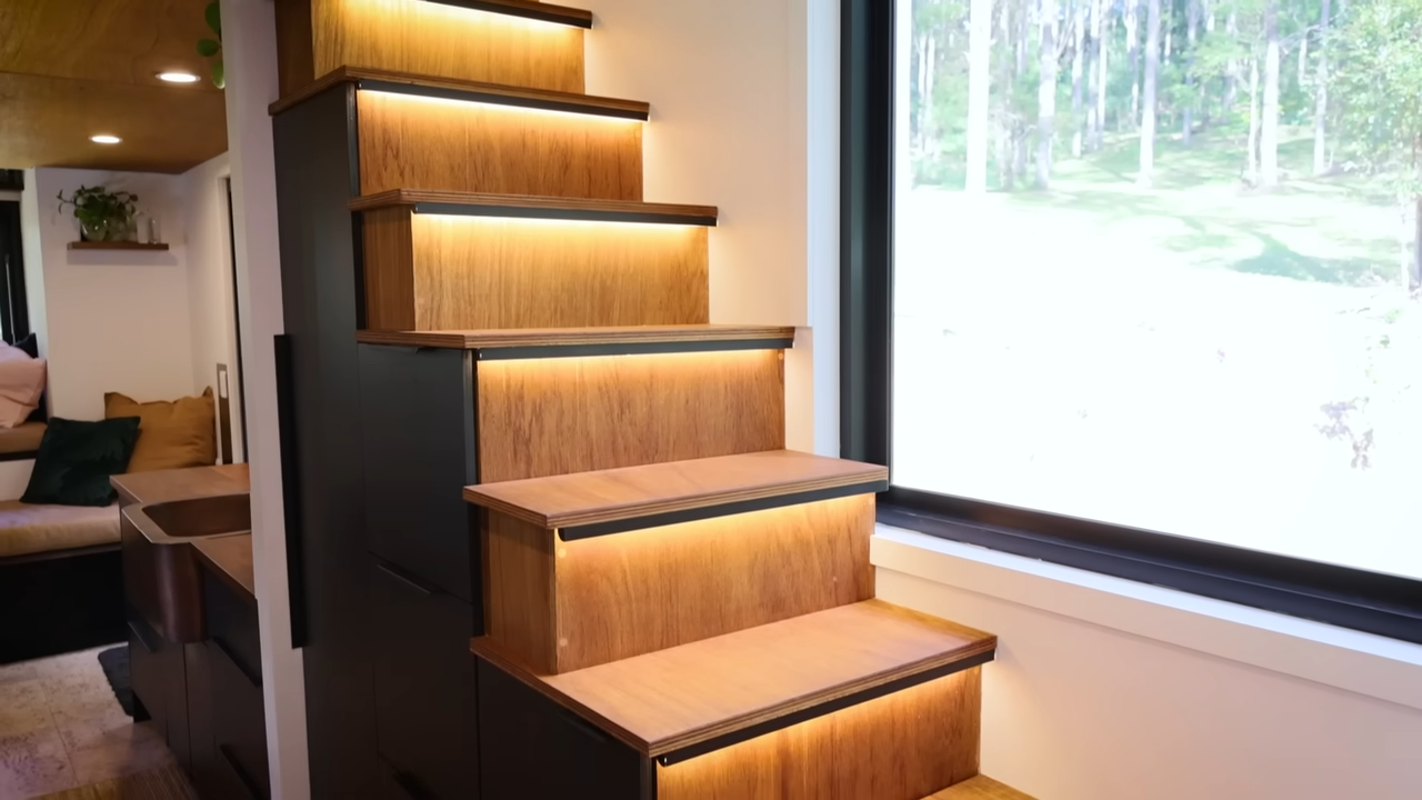 Light up wooden staircase with storage