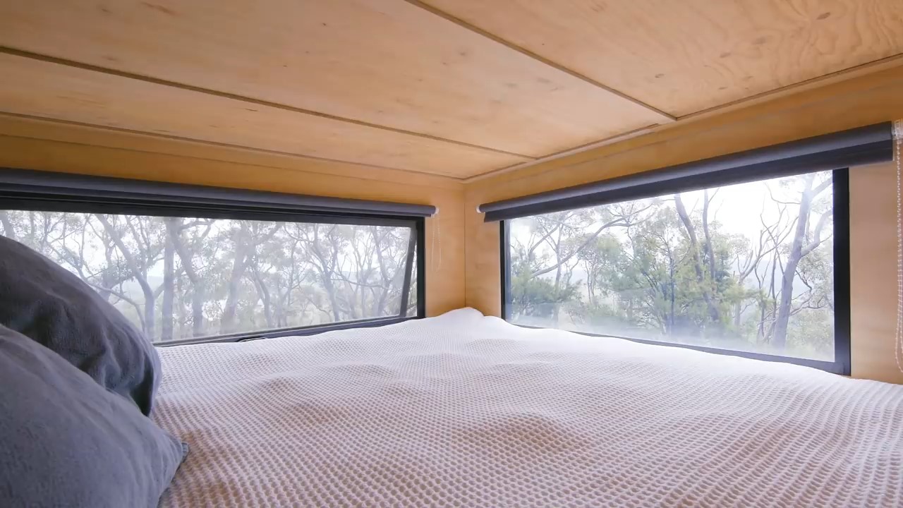 Loft with king-sized bed and two large windows