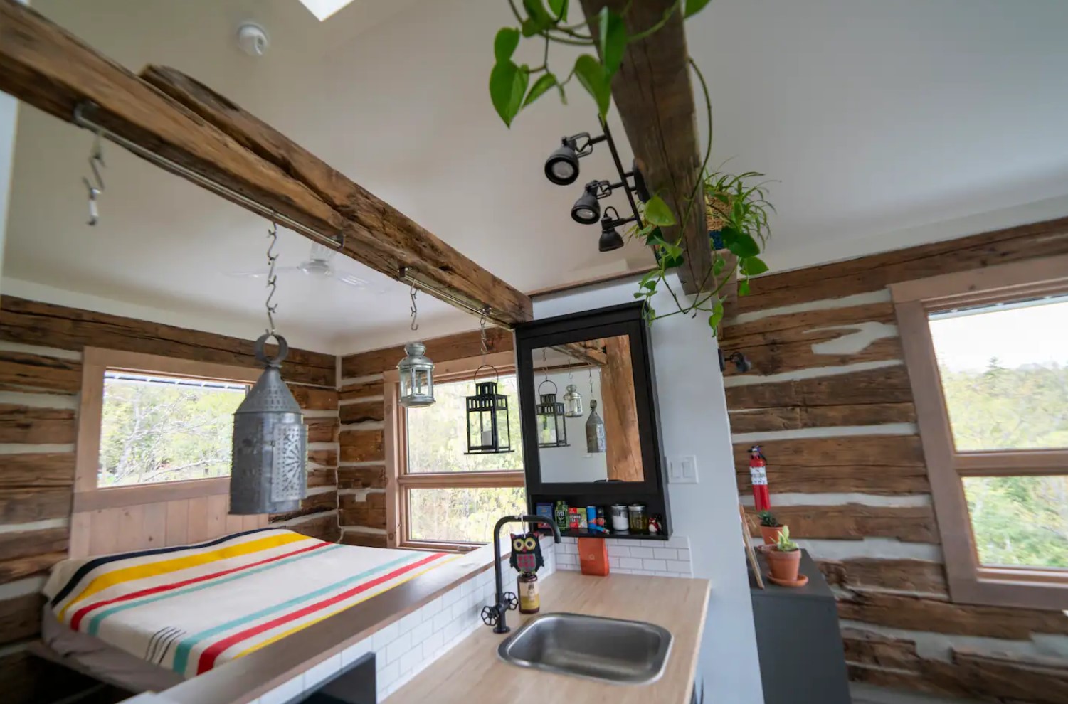 Tree house master bedroom with two windows