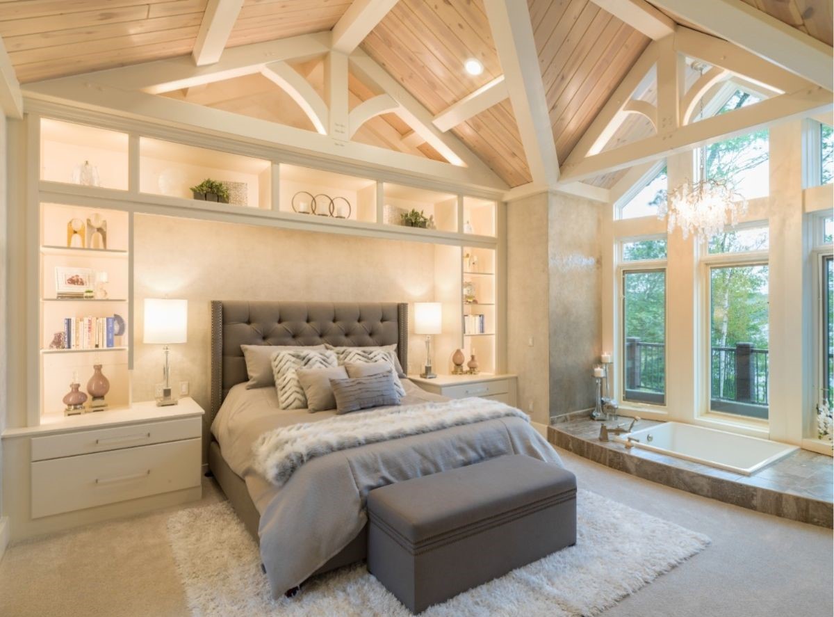 Master bedroom with white wood and shelves with decorations