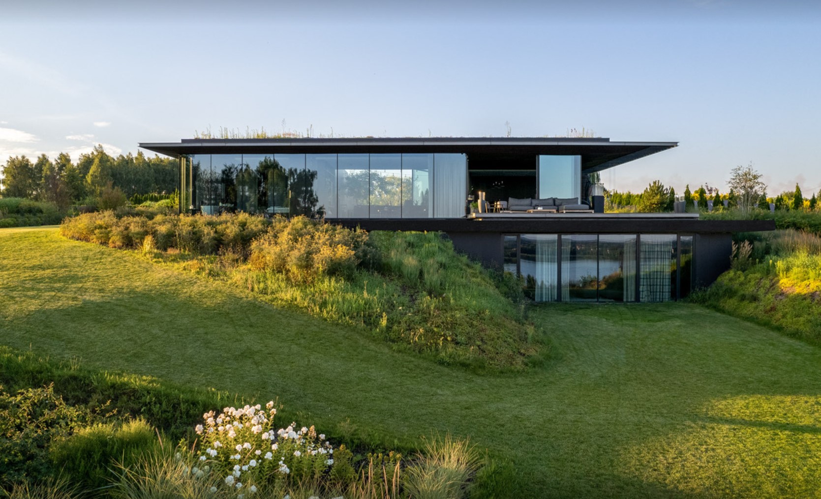 Modern home on a hill with glass walls