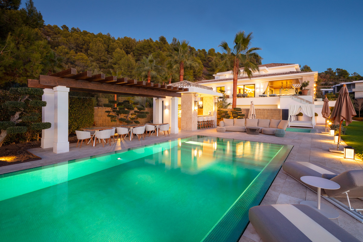 Huge outdoor pool with bar and lounge area